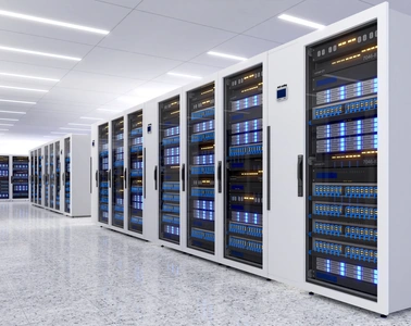 Modern data center with rows of white server racks