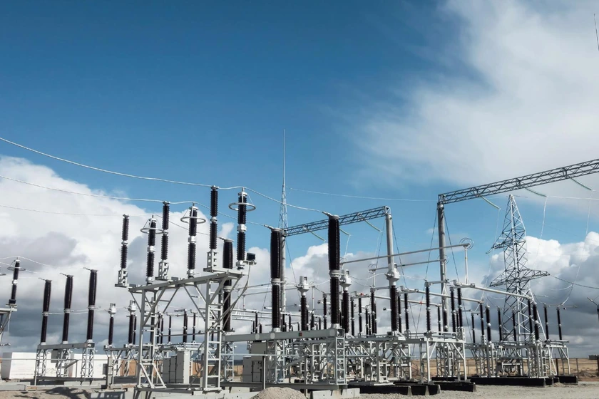 220 kV air-insulated switchyard with disconnectors and circuit breakers at a Kazakhstan wind farm substation