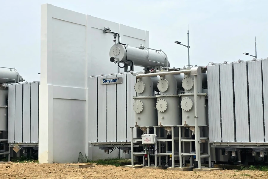 Power transformers separated by fire walls at a battery energy storage substation